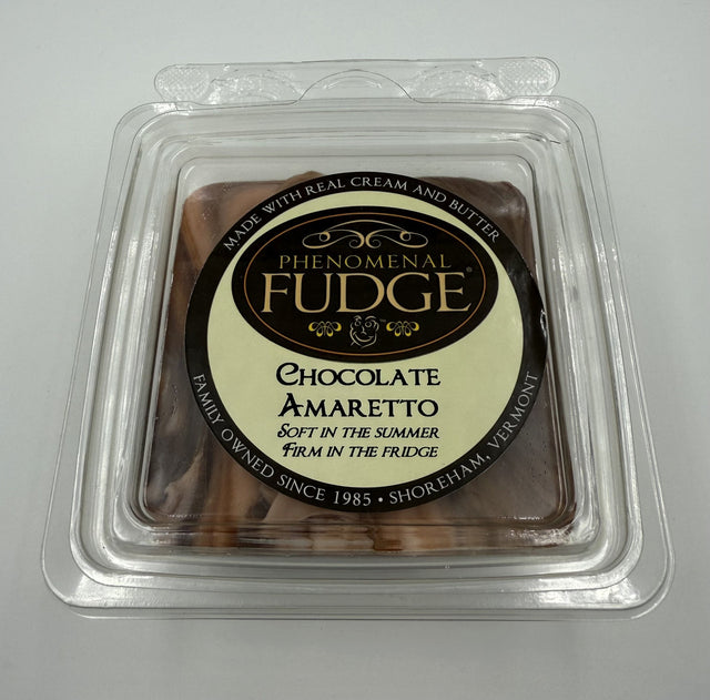 Packaged chocolate fudge with amaretto swirls on a white background