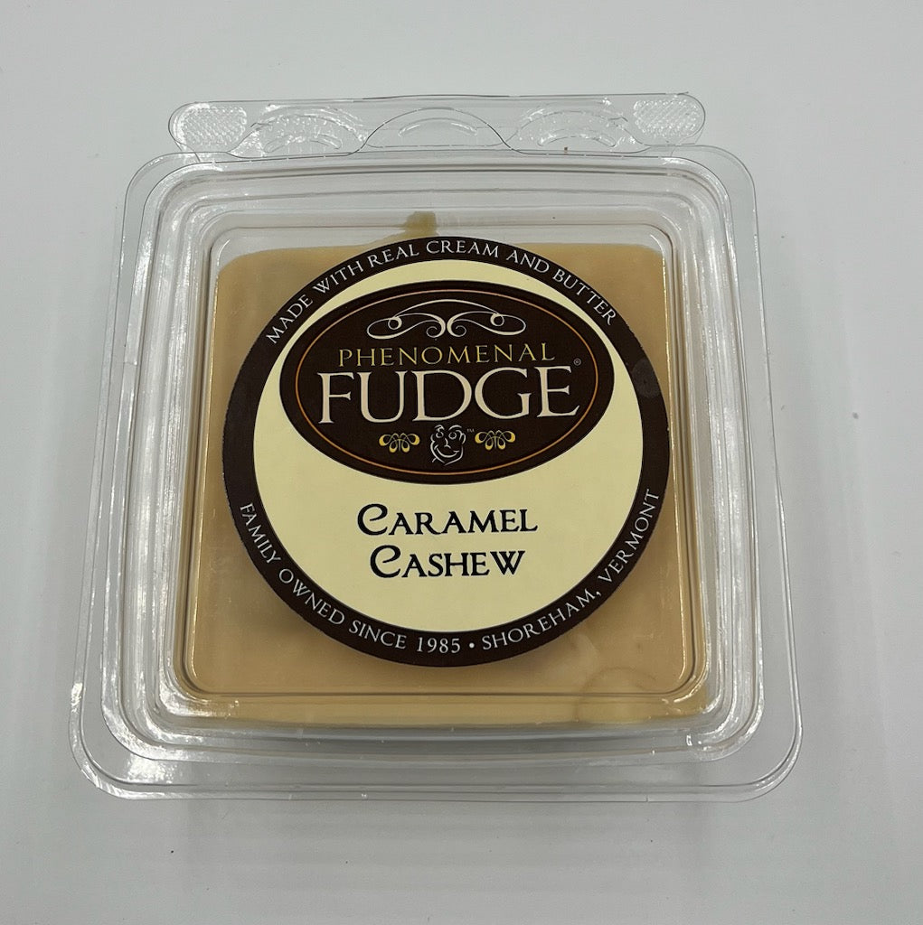 Caramel Cashew fudge in a clear plastic packaging on a white background