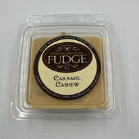 Caramel Cashew fudge in a clear plastic packaging on a white background