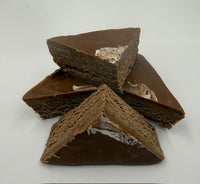 Light chocolate fudge with caramel on a white background