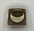 Milk chocolate fudge in a clear plastic packaging with 'Phenomenal Fudge' branding on a white background.