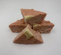 Vanilla fudge pieces with pink strawberry mash